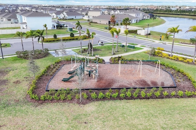 view of property's community featuring a water view, a residential view, and playground community