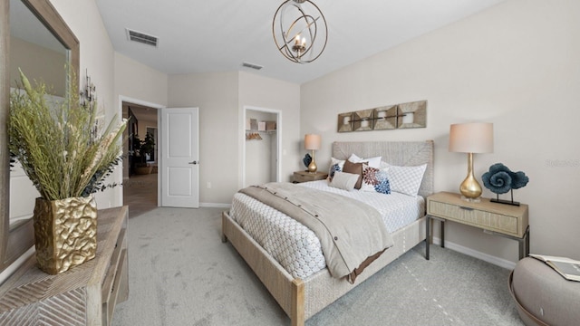 bedroom featuring baseboards, visible vents, a chandelier, and light colored carpet