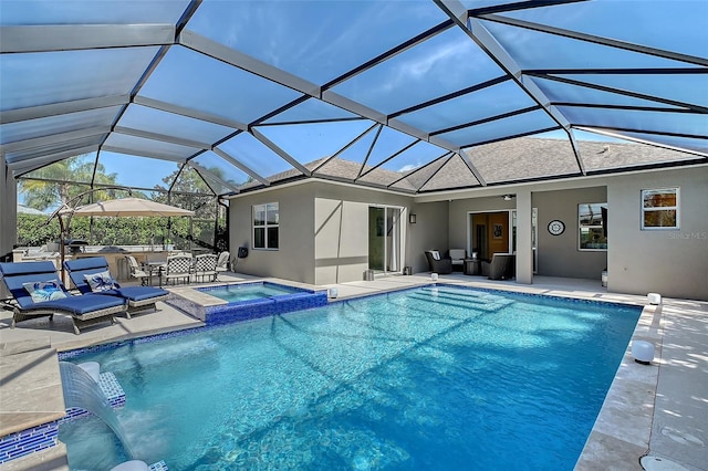 view of pool with glass enclosure, outdoor lounge area, a patio area, and a pool with connected hot tub