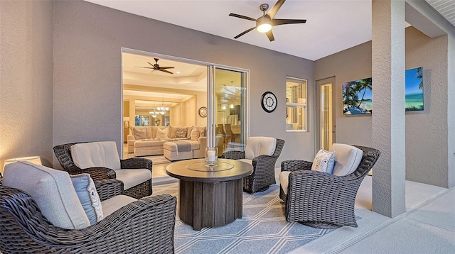 view of patio featuring outdoor lounge area and a ceiling fan