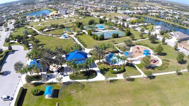 aerial view with a water view and a residential view