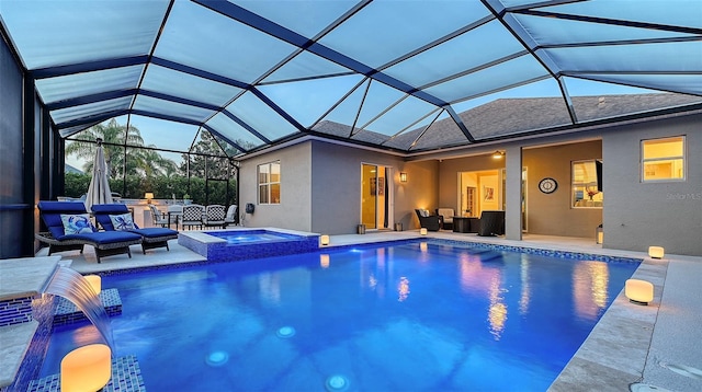 view of swimming pool with a pool with connected hot tub, a patio area, a lanai, and an outdoor living space