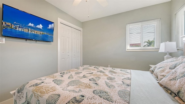 bedroom featuring a ceiling fan and a closet