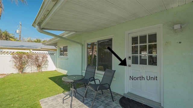 view of patio with fence