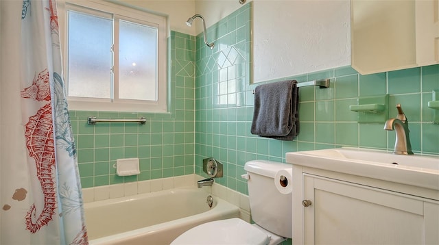 full bath featuring toilet, tile walls, shower / tub combo with curtain, and vanity