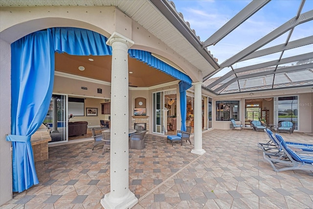 view of patio / terrace with glass enclosure