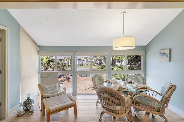 sunroom with lofted ceiling