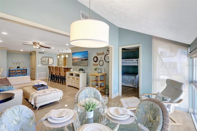 living room with lofted ceiling, recessed lighting, visible vents, light wood-style flooring, and a ceiling fan