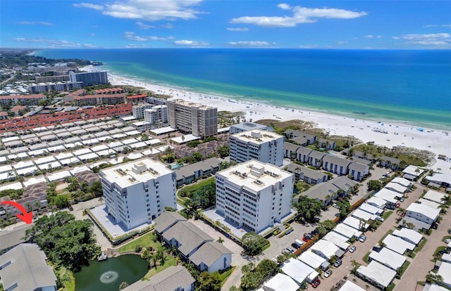 bird's eye view featuring a city view, a beach view, and a water view