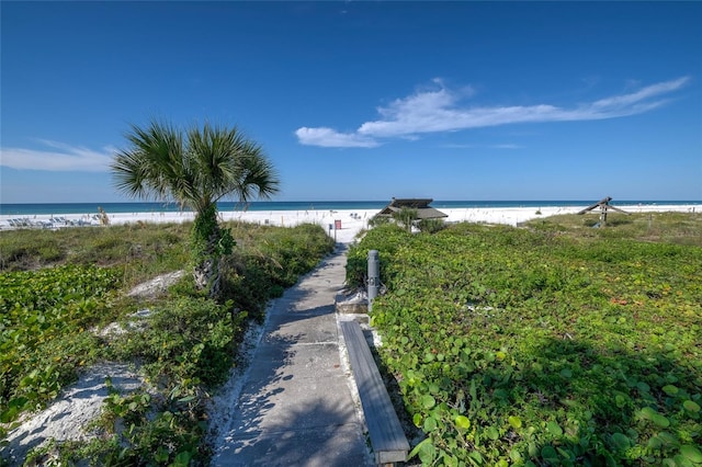 property view of water featuring a beach view