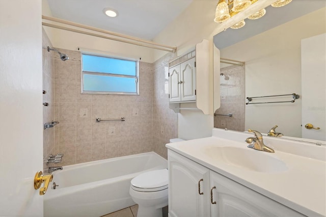 bathroom with shower / bath combination, vanity, and toilet