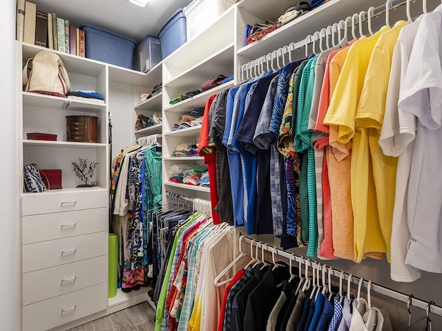 spacious closet with light wood-style flooring