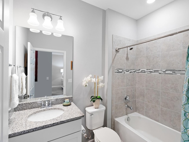 full bathroom with vanity, toilet, and shower / bath combo with shower curtain