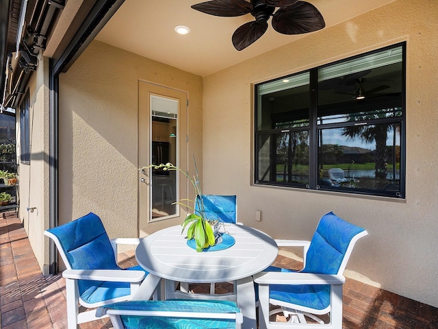 view of patio with ceiling fan