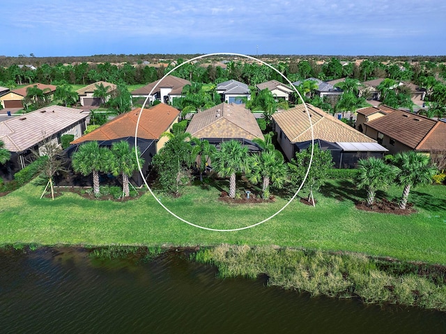 aerial view featuring a water view and a residential view