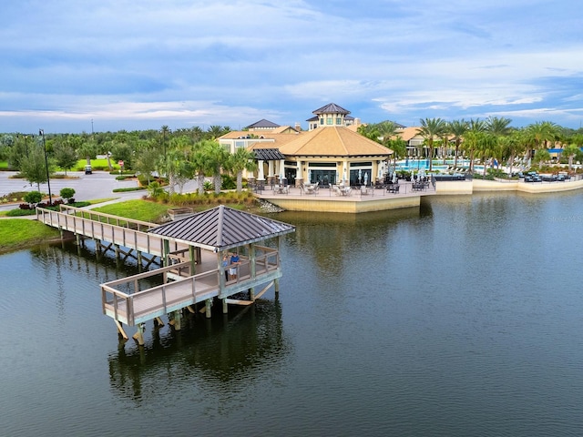 dock area featuring a gazebo and a water view