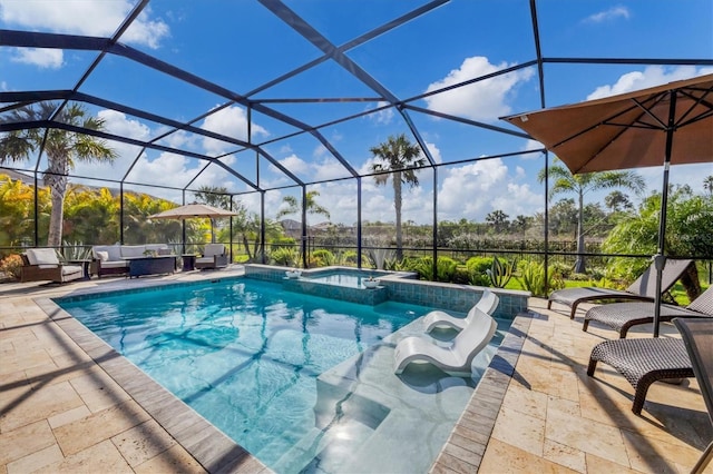 view of swimming pool featuring an outdoor living space, a pool with connected hot tub, glass enclosure, and a patio