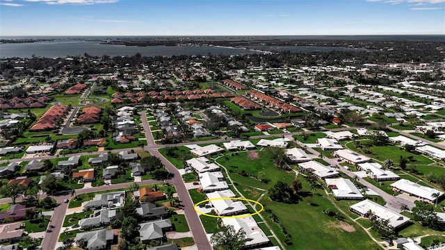 aerial view with a water view and a residential view