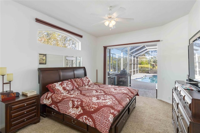 bedroom featuring a sunroom, light colored carpet, access to exterior, and a ceiling fan
