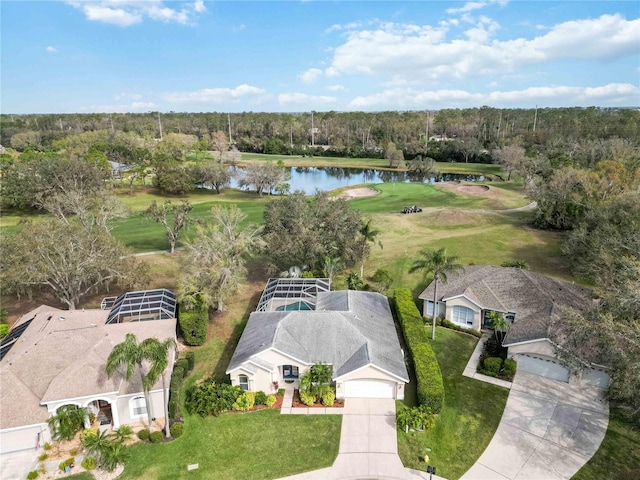 view of subject property with a large body of water and a local golf course
