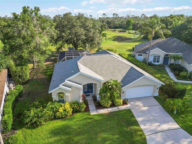 10306 Palmbrooke Ter, Bradenton, FL 34202 - aerial view of property and surrounding area featuring a tree filled landscape and a golf course
