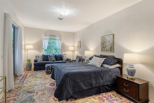 bedroom with visible vents