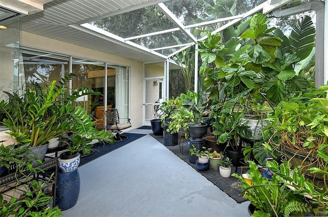 view of patio / terrace with glass enclosure