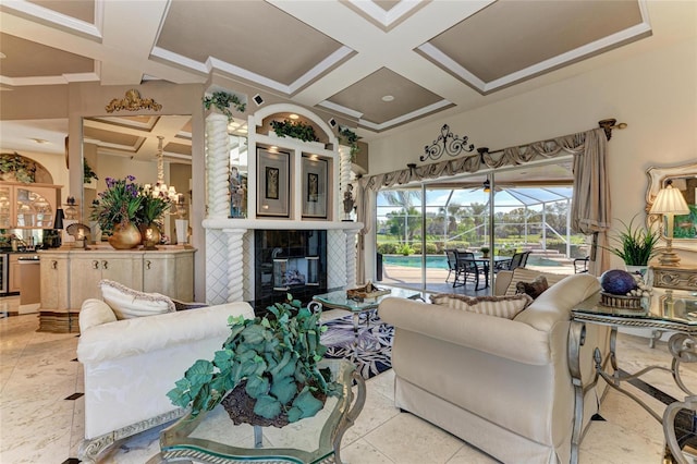 living room with crown molding, a sunroom, a tile fireplace, coffered ceiling, and beamed ceiling