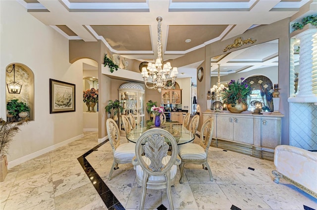 dining area featuring baseboards, coffered ceiling, arched walkways, and a notable chandelier