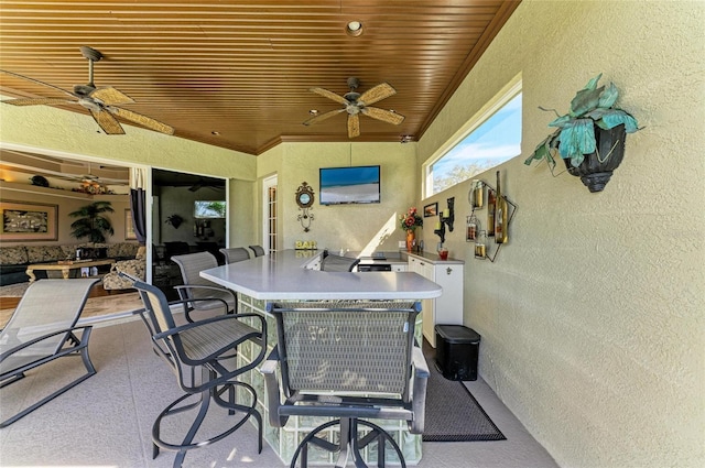 view of patio with ceiling fan