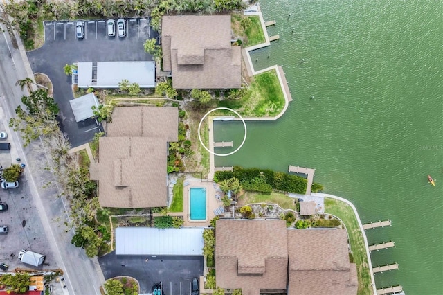 bird's eye view with a water view