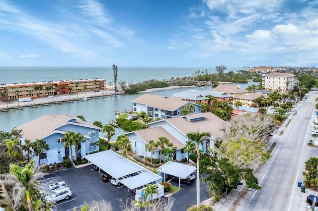 aerial view with a water view and a residential view