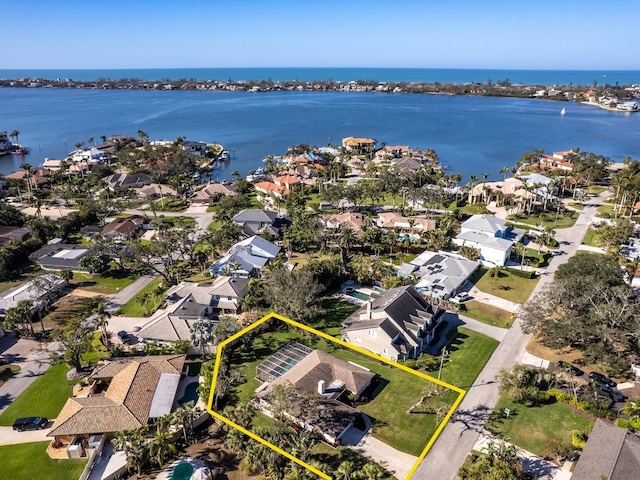 aerial view featuring a water view and a residential view