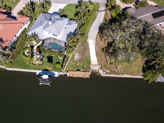 bird's eye view featuring a residential view and a water view