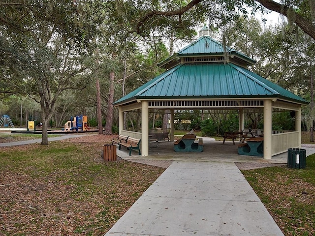 view of home's community with playground community and a gazebo