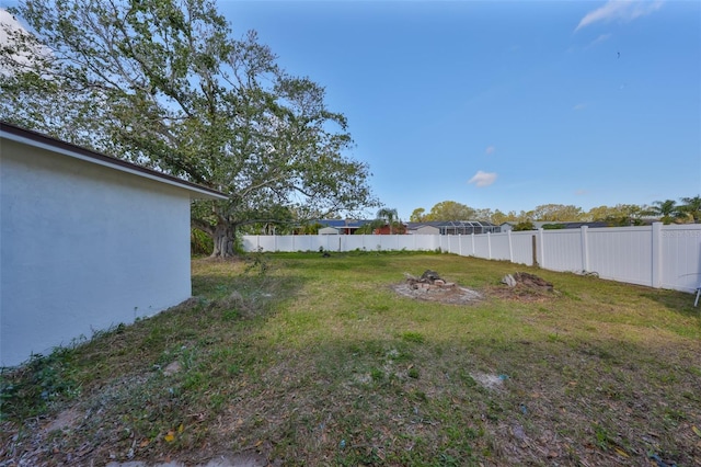 view of yard with fence