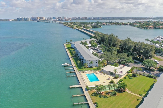 bird's eye view with a view of city and a water view