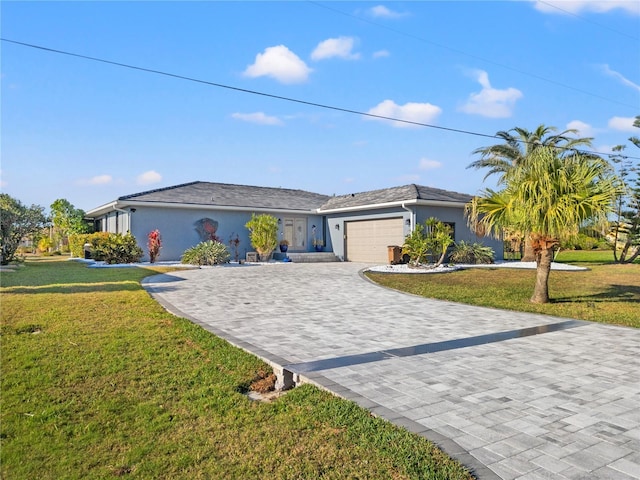 single story home with an attached garage, a front lawn, decorative driveway, and stucco siding