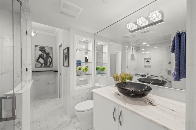 bathroom with a marble finish shower, visible vents, toilet, marble finish floor, and vanity