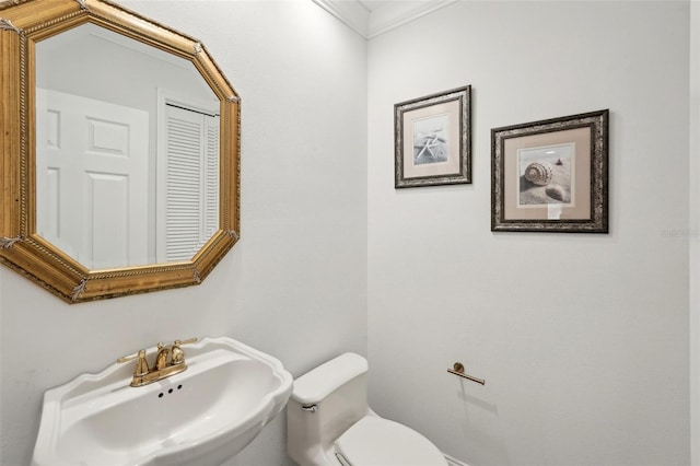 bathroom with a sink and toilet