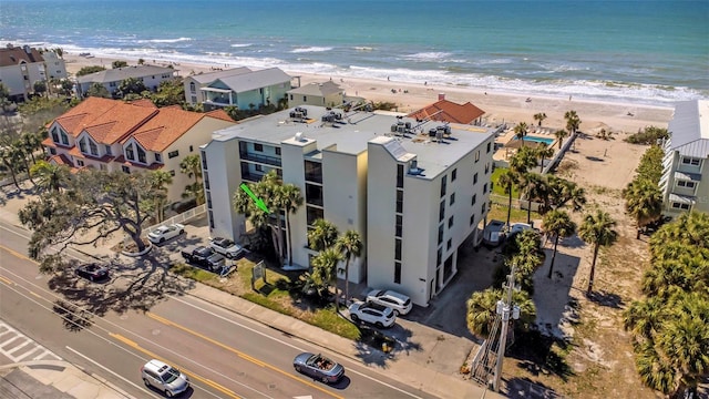 aerial view featuring a water view and a view of the beach