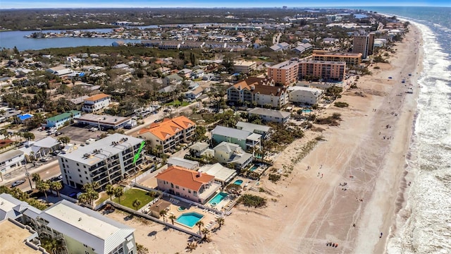 aerial view featuring a water view and a view of the beach