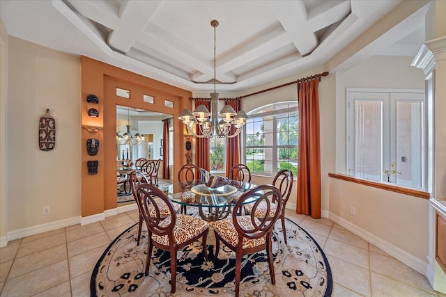 dining space with light tile patterned floors, baseboards, and an inviting chandelier