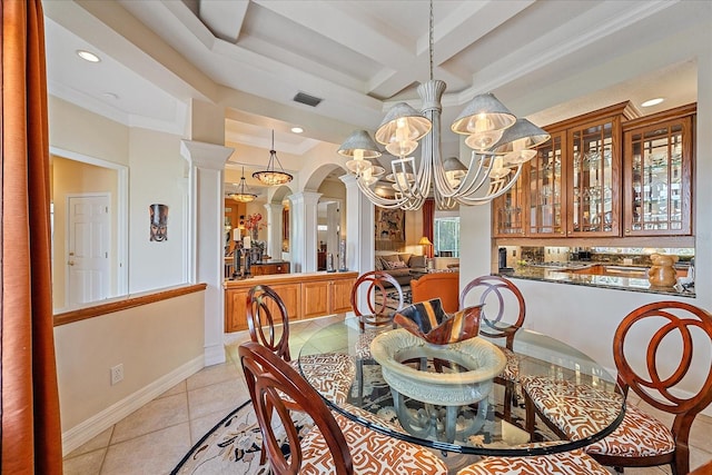 6617 Nautical Dr, Lakewood Ranch, FL 34202 - dining room featuring arched walkways, a chandelier, light tile patterned flooring, coffered ceiling, and decorative columns