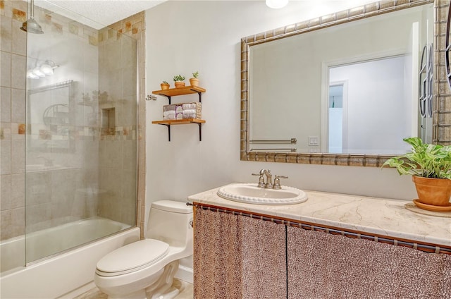 bathroom with vanity, combined bath / shower with glass door, and toilet