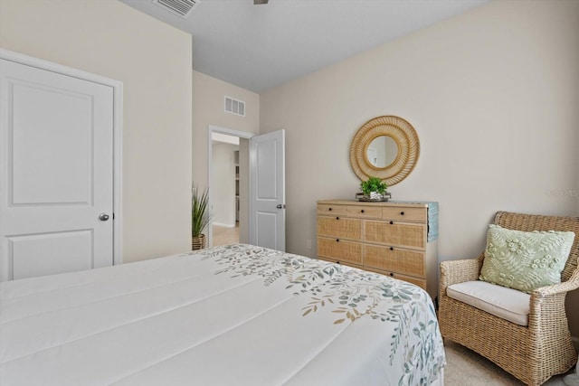 bedroom featuring visible vents