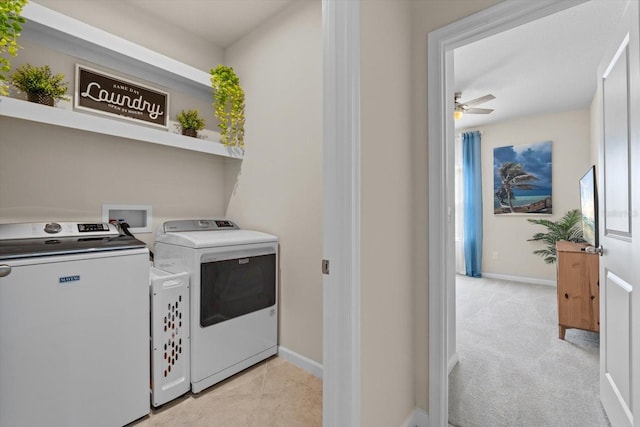 washroom featuring plenty of natural light, laundry area, independent washer and dryer, and baseboards