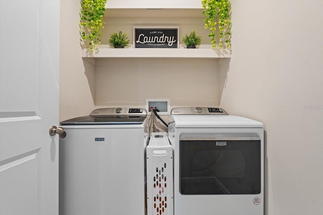 laundry room featuring laundry area and washing machine and dryer