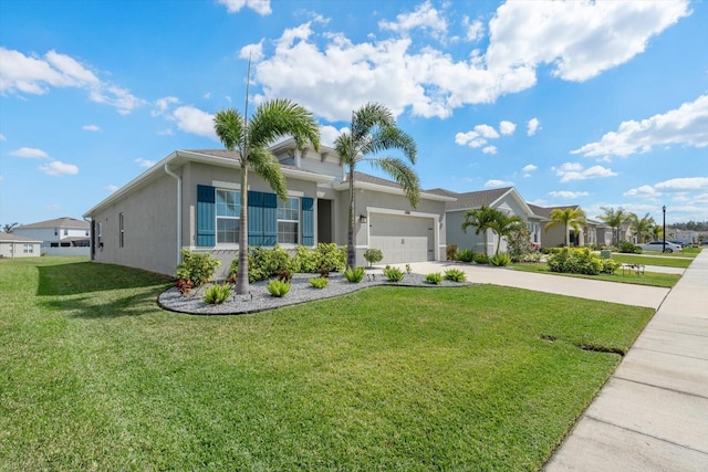 single story home featuring an attached garage, a front yard, concrete driveway, and stucco siding