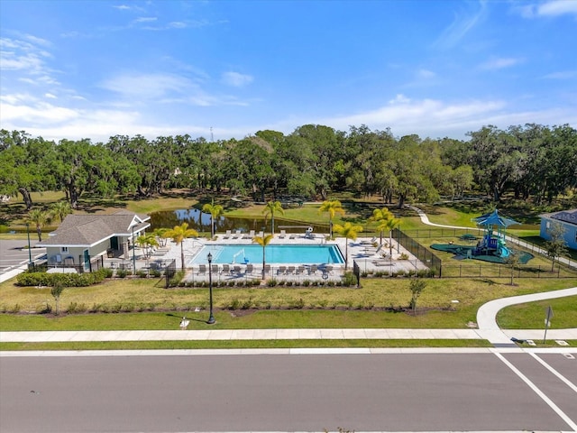 birds eye view of property with a water view